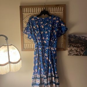 Blue floral dress. Ties at waist.